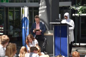 Professor Chris Gallavin (left) with Fatimah Khan, from Newlands College, reading her creative writing in 2018. She is a finalist this year too.