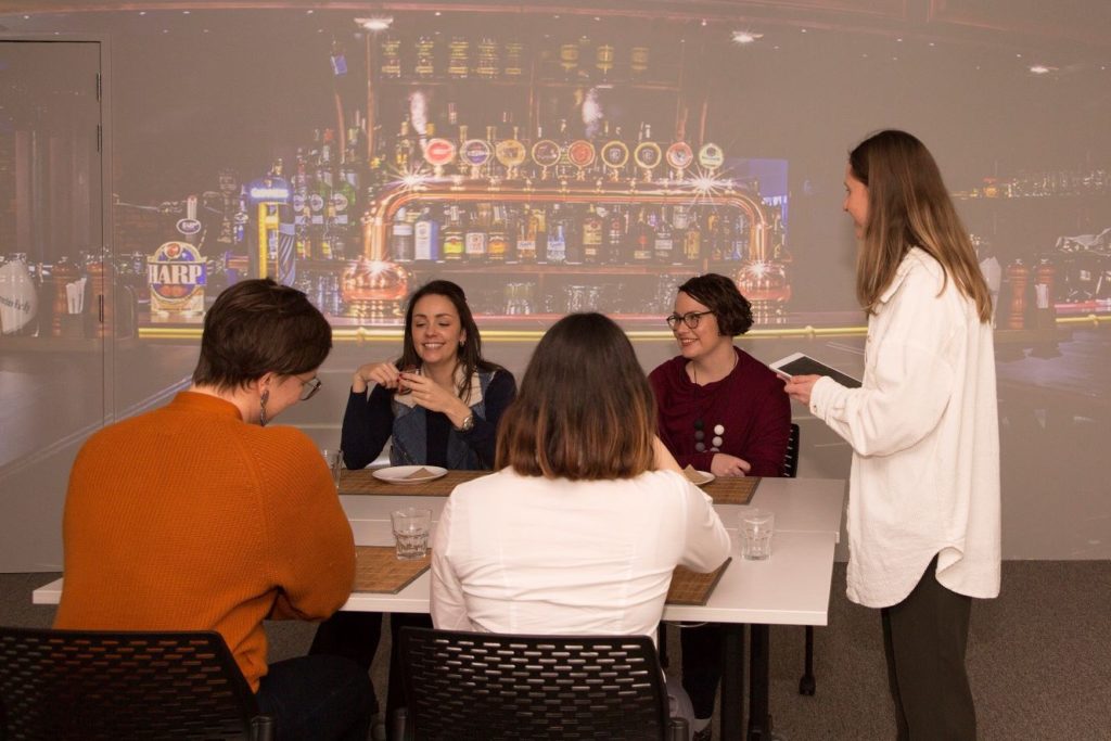 Consumers in a recreated bar restaurant